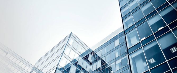Looking up at office building